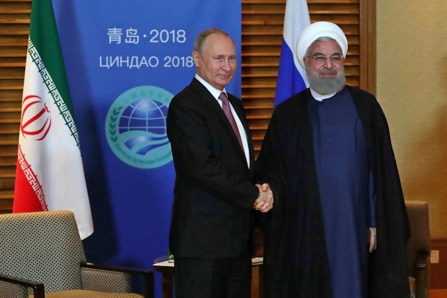 Владимир Путин и Хасан Рухани на саммите ШОС. 2018