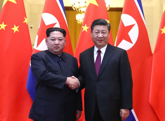  Ким Чен Ын и Си Цзиньпин 