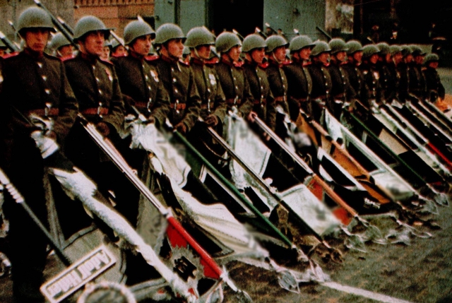Советские солдаты бросают фашисткие знамена на землю перед Мавзолеем. Москва. 1945
