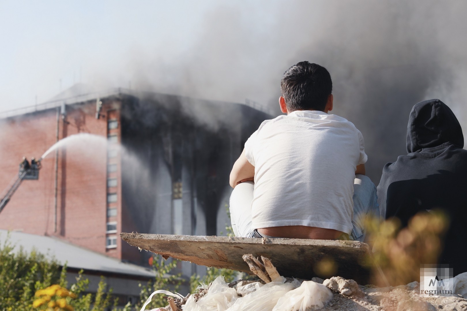 Очевидцы пожара в Невском районе Петербурга. Дарья Драй © ИА REGNUM ...