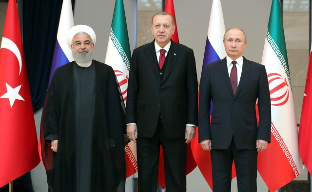 Встреча Владимира Путина с президентом Ирана Хасаном Рухани и президентом Турции Реджепом Тайипом Эрдоганом. Анкара. 2018