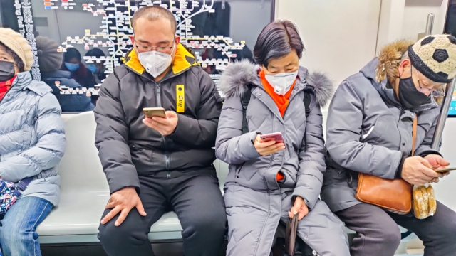 Люди в масках в Китае. Алексей Попов © ИА Красная Весна