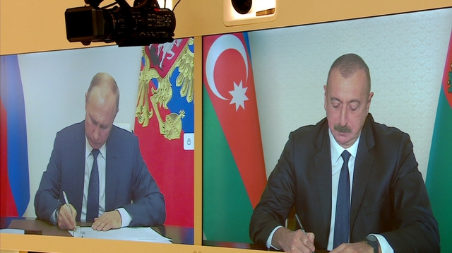 Момент подписания заявления президентом Российской Федерации Владимиром Путиным и президентом Азербайджанской Республики Ильхамом Алиевым. 2020г. 