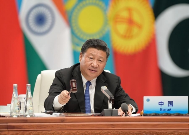Си Цзиньпин выступает с речью на 18-м заседании Совета глав государств-членов ШОС 