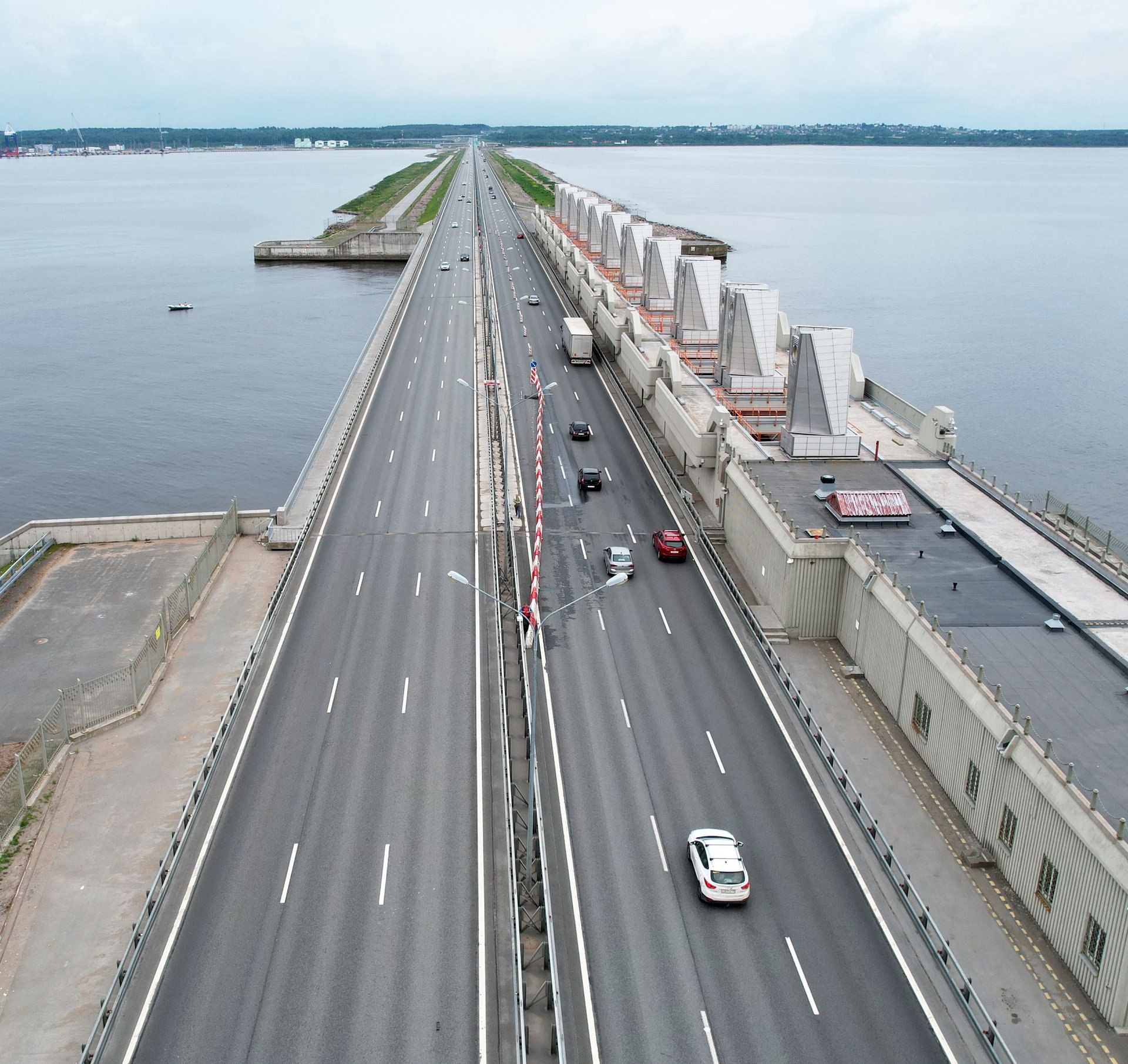 Движения петербурга. Мост Кронштадт КАД. КАД Кронштадт дамба. Дамба Питер Кронштадт. Дамба Кронштадт 2004.